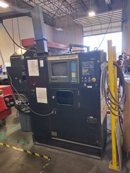 55 Ton, AMADA, COMA 557 FANUC O4PC, 58 STA., 2 A/I, 1995