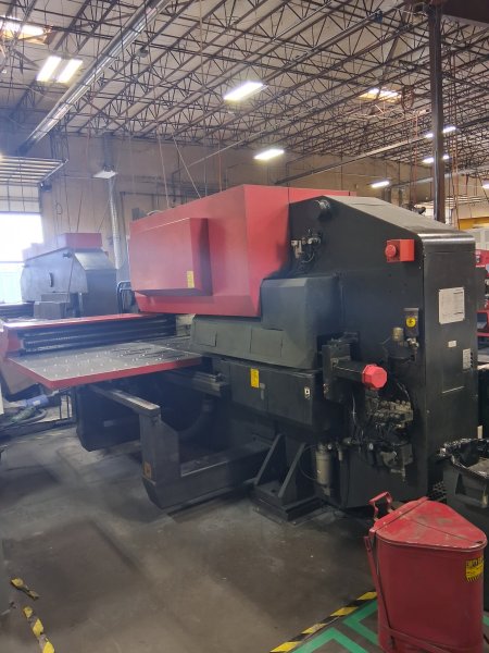 55 Ton, AMADA, COMA 557 FANUC O4PC, 58 STA., 2 A/I, 1995